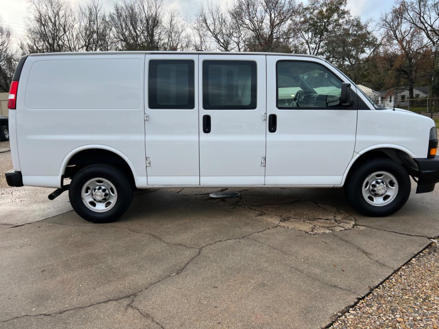 2021 White /Gray Chevrolet Express (1GCWGAFP0M1) with an 4.3L V6 engine, Automatic transmission, located at 4520 Airline Hwy, Baton Rouge, LA, 70805, (225) 357-1497, 30.509325, -91.145432 - 2021 Chevy Express 2500 Cargo Van 4.3 V6 152K Miles, Power Windows & Locks, Cold A/C & Heat, Dent In Rear Bumper(See Pic). NO IN HOUSE FINANCING. FOR INFO PLEASE CONTACT JEFF AT 225 357-1497 CHECK OUT OUR A+ RATING WITH THE BETTER BUSINESS BUREAU WE HAVE BEEN A FAMILY OWNED AND OPERATED BUSINESS AT - Photo#4